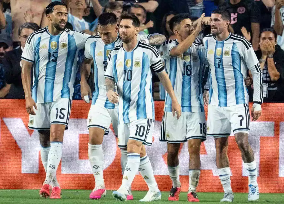 Argentina forward Lionel Messi celebrates with his team