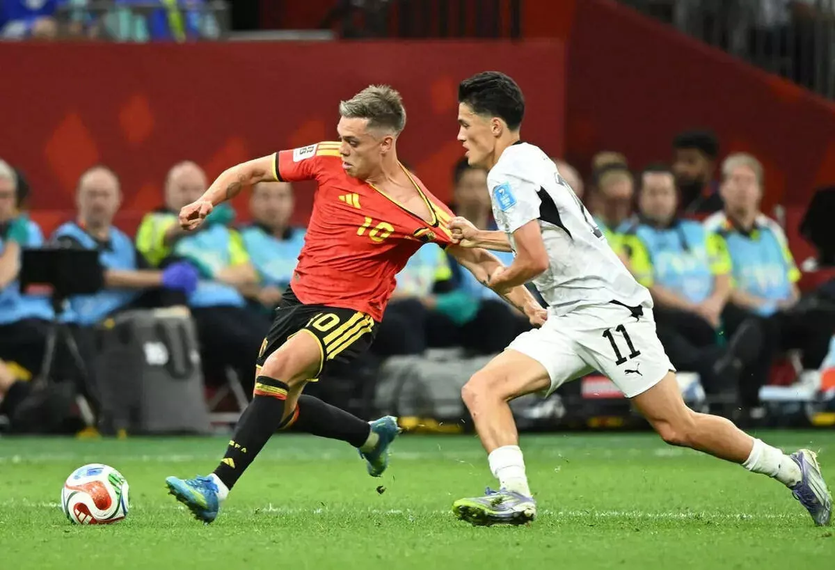 Belgium's Leandro Trossard in action with New Zealand's Elijah Just.