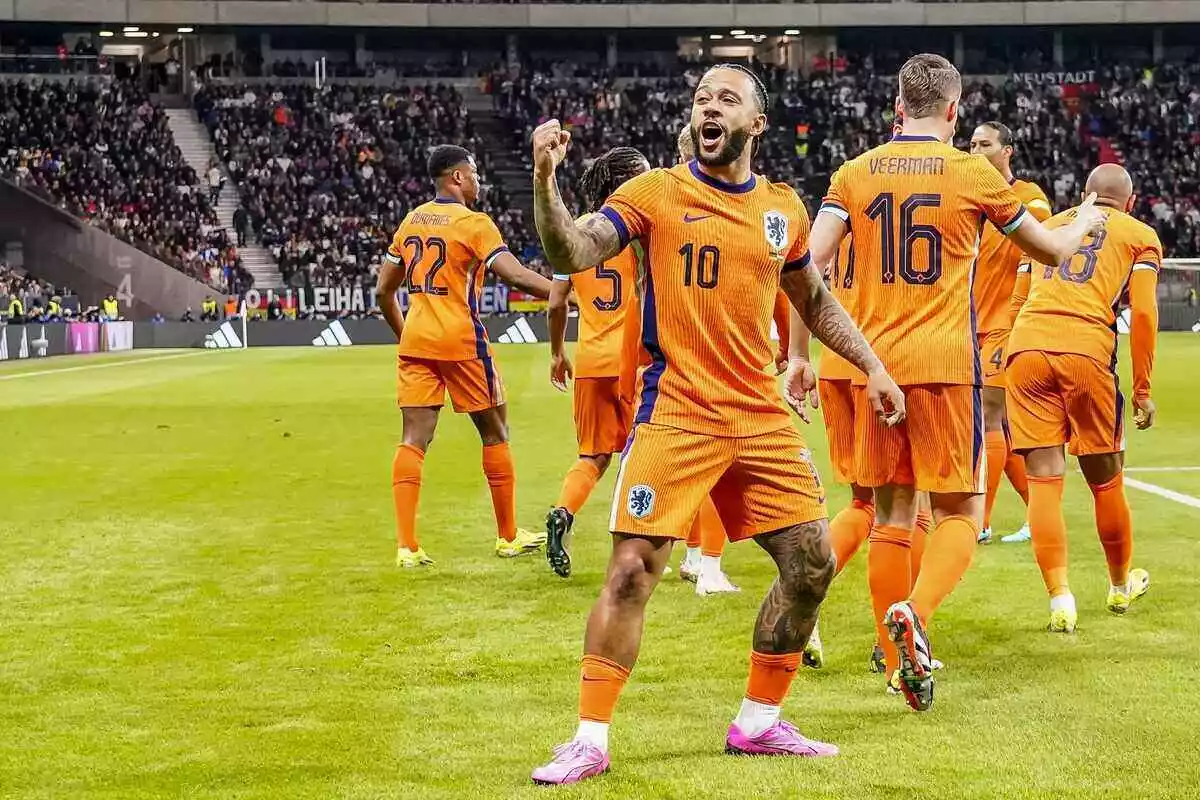 Netherlands striker Memphis Depay celebrates goal vs Germany