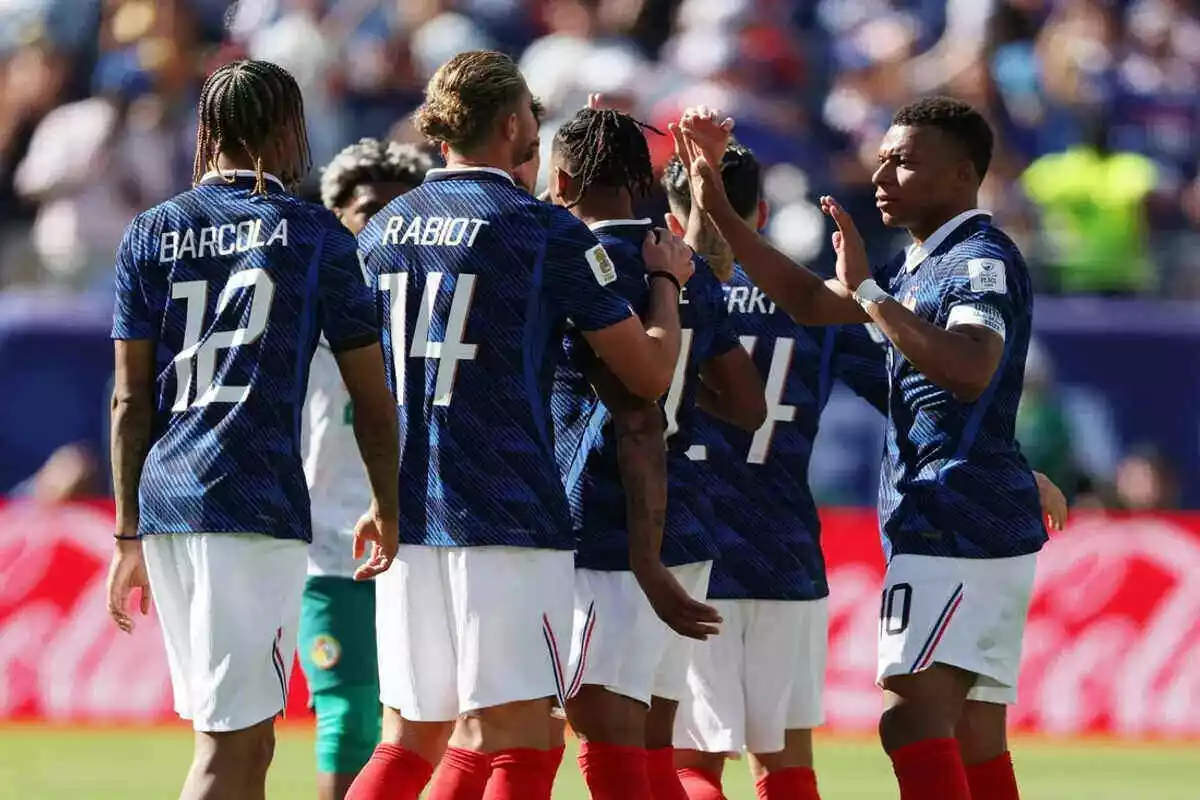 France's Kylian Mbappe celebrates with teammates