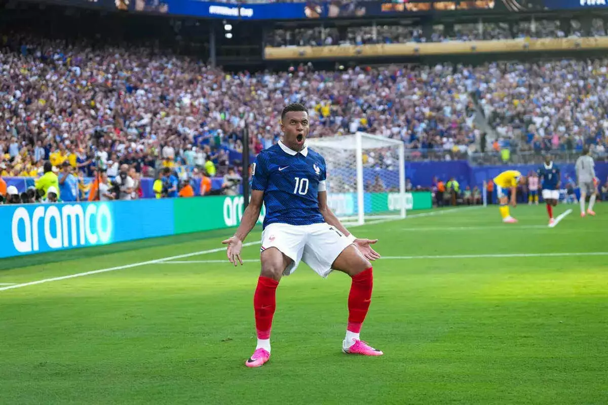 Kylian Mbappe celebrates goal against Sweden at the World Cup