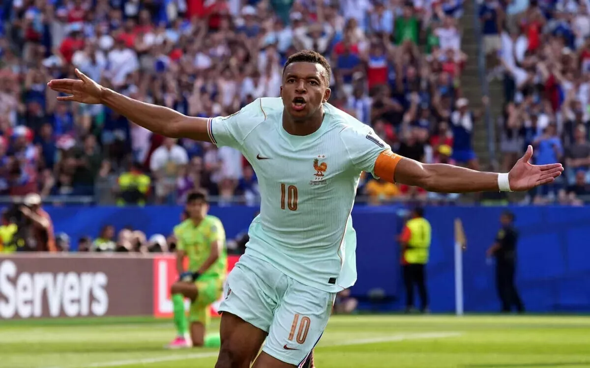 France's Kylian Mbappe celebrates scoring their first goal