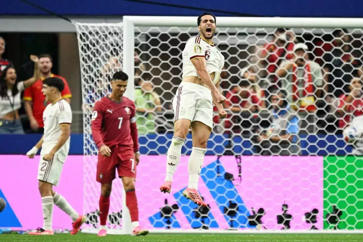 Spain's Mikel Merino celebrates after the match