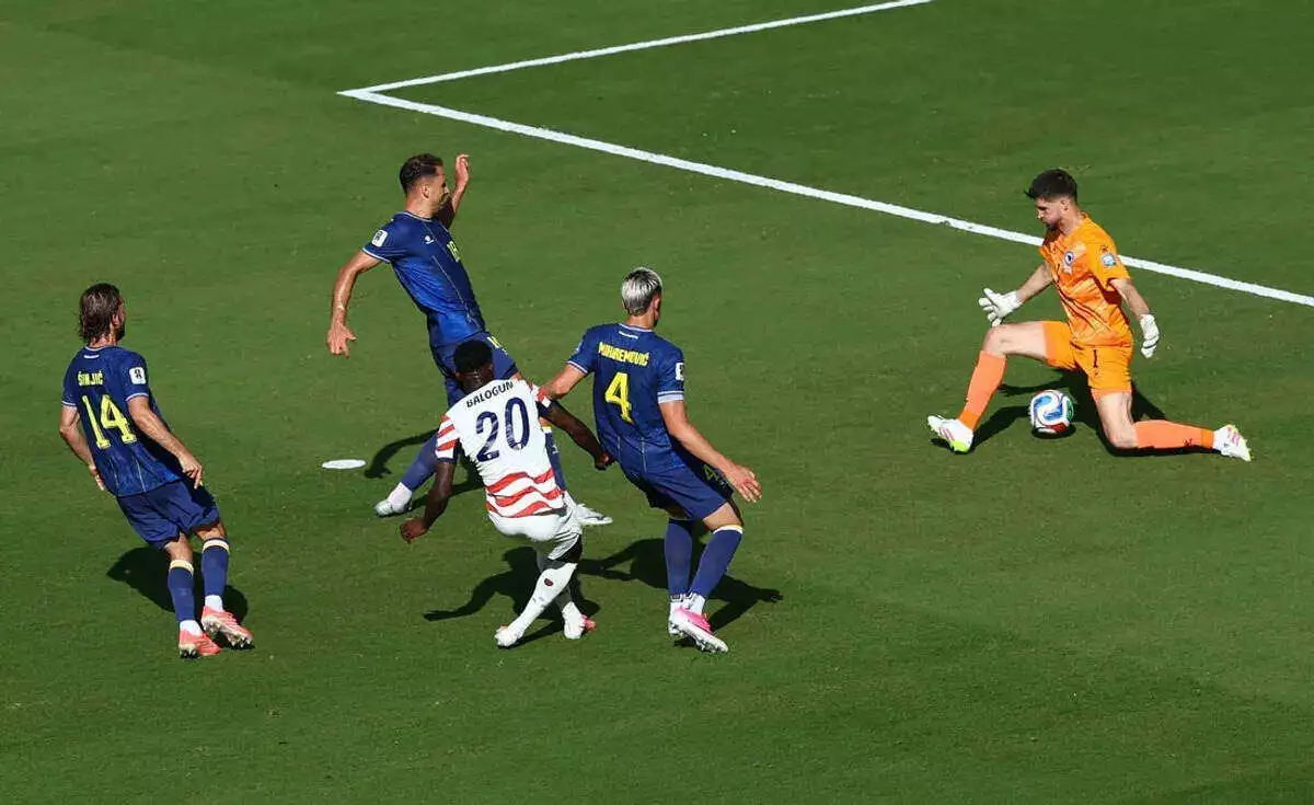 Folarin Balogun of the U.S. scores their first goal