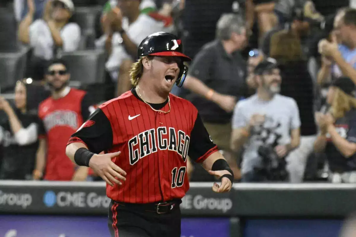 Chicago White Sox second baseman Chase Meidroth celebrates after scoring against the Los Angeles Dodgers