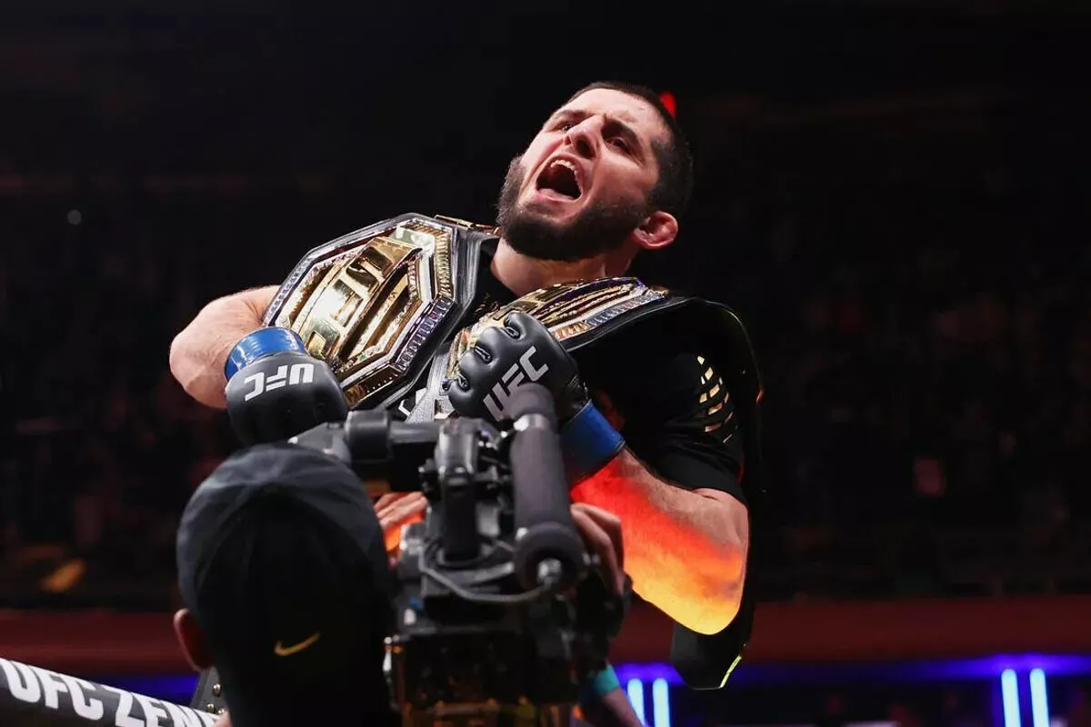 Islam Makhachev celebrates after defeating Jack Della Maddalena at UFC 322