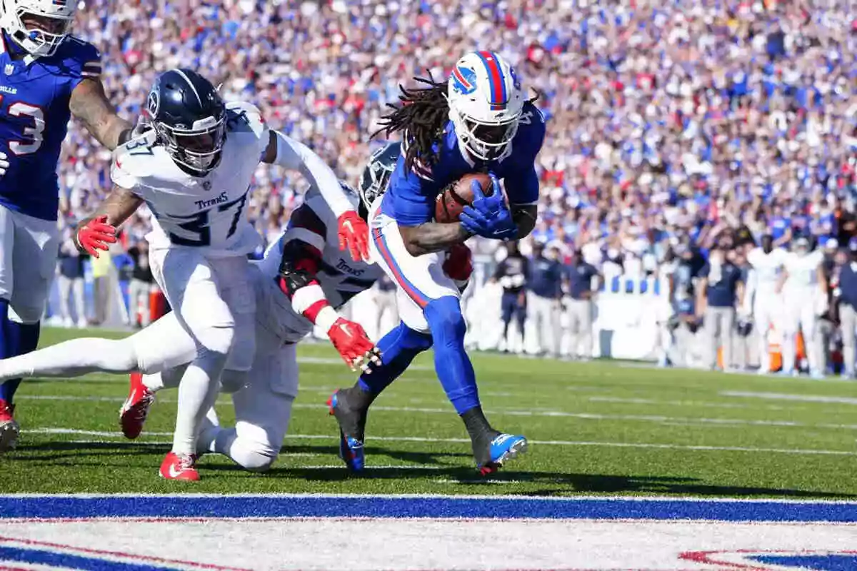 Bills running back James Cooks runs in a touchdown