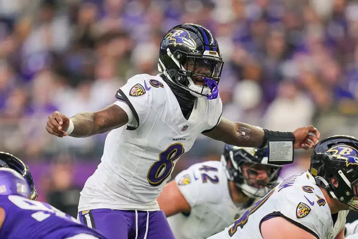 Baltimore Ravens quarterback Lamar Jackson under center