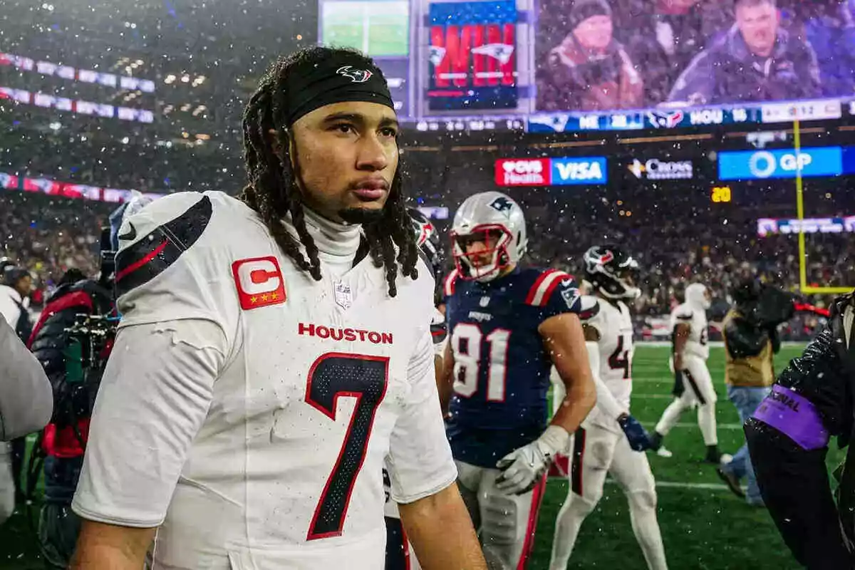 Texans quarterback CJ Stroud walks off the field after game vs. Patriots
