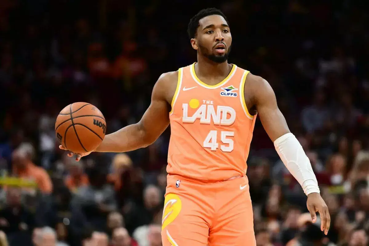 Cleveland Cavaliers guard Donovan Mitchell brings the ball up court