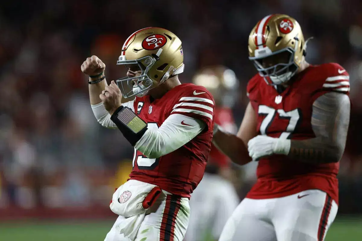 San Francisco 49ers quarterback Brock Purdy celebrates touchdown