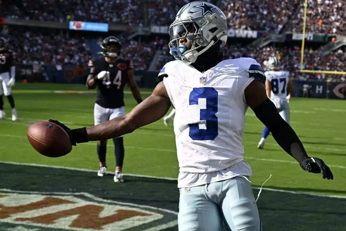 Cowboys wide receiver George Pickens celebrates scoring a touchdown