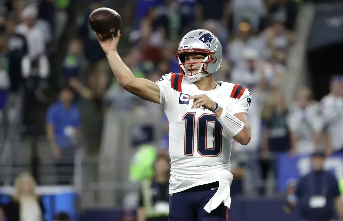 New England Patriots quarterback Drake Maye throws the ball