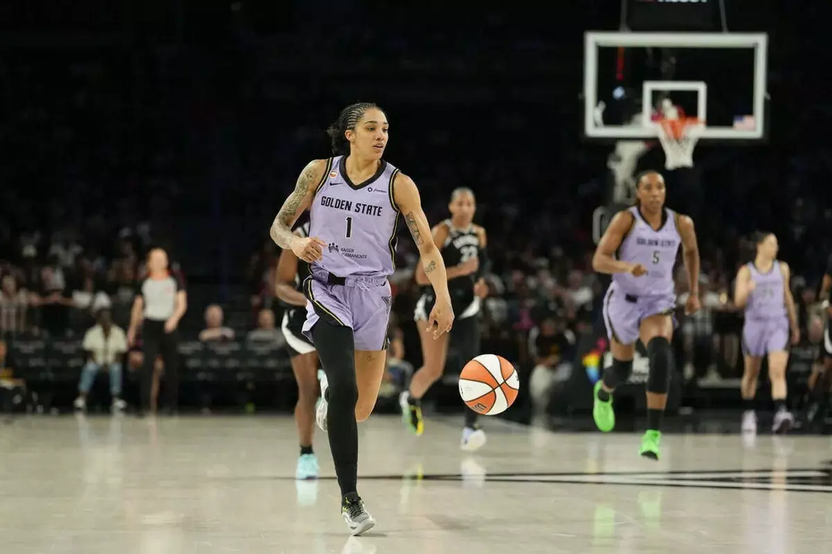 Golden State Valkyries forward Gabby Williams dribbles the ball