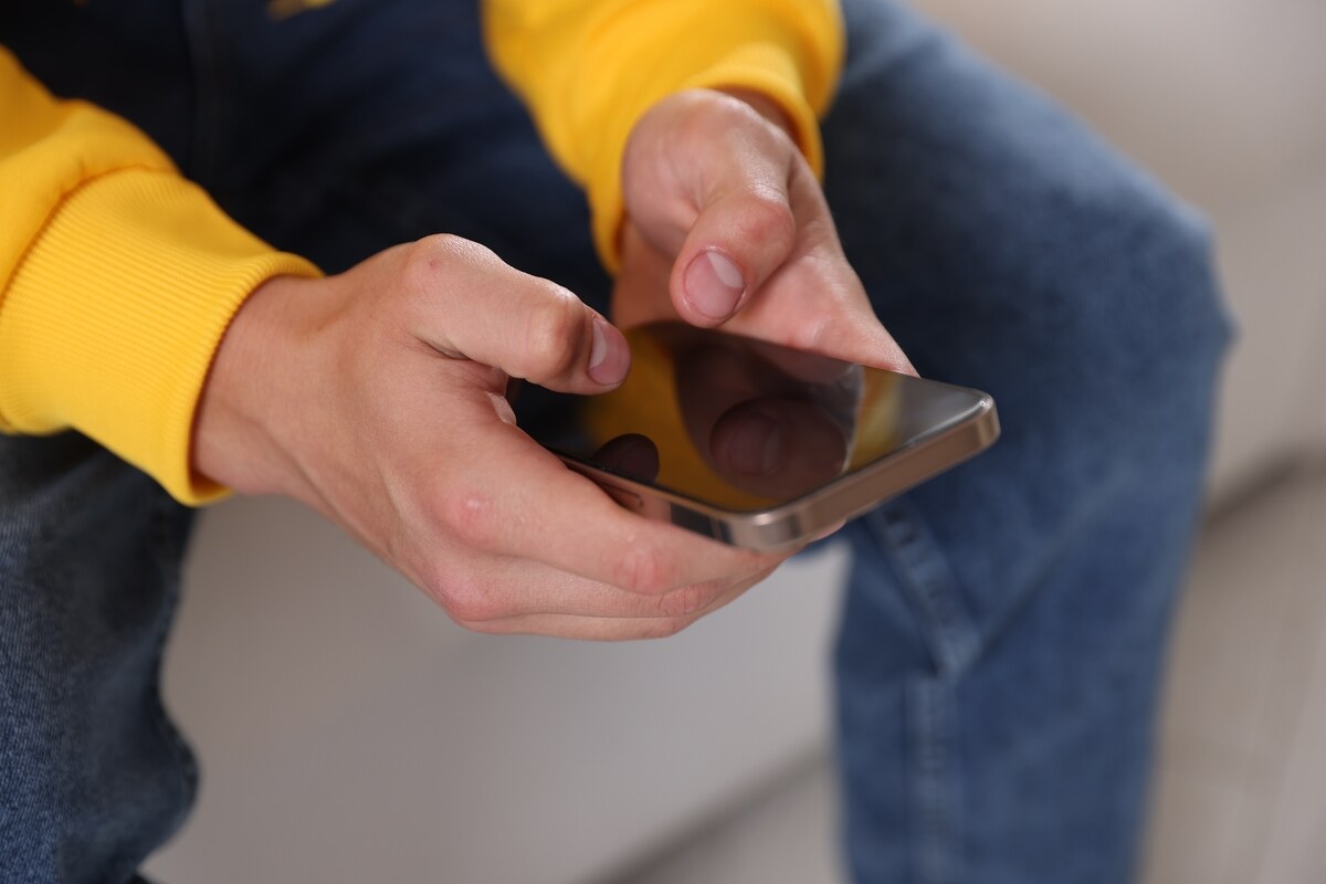teenager on mobile